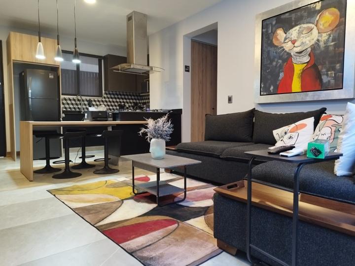 Sala con cocina abierta